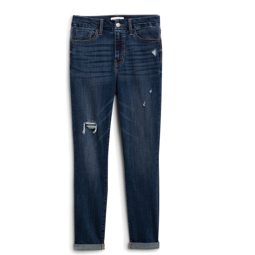 Distressed dark blue skinny jeans.